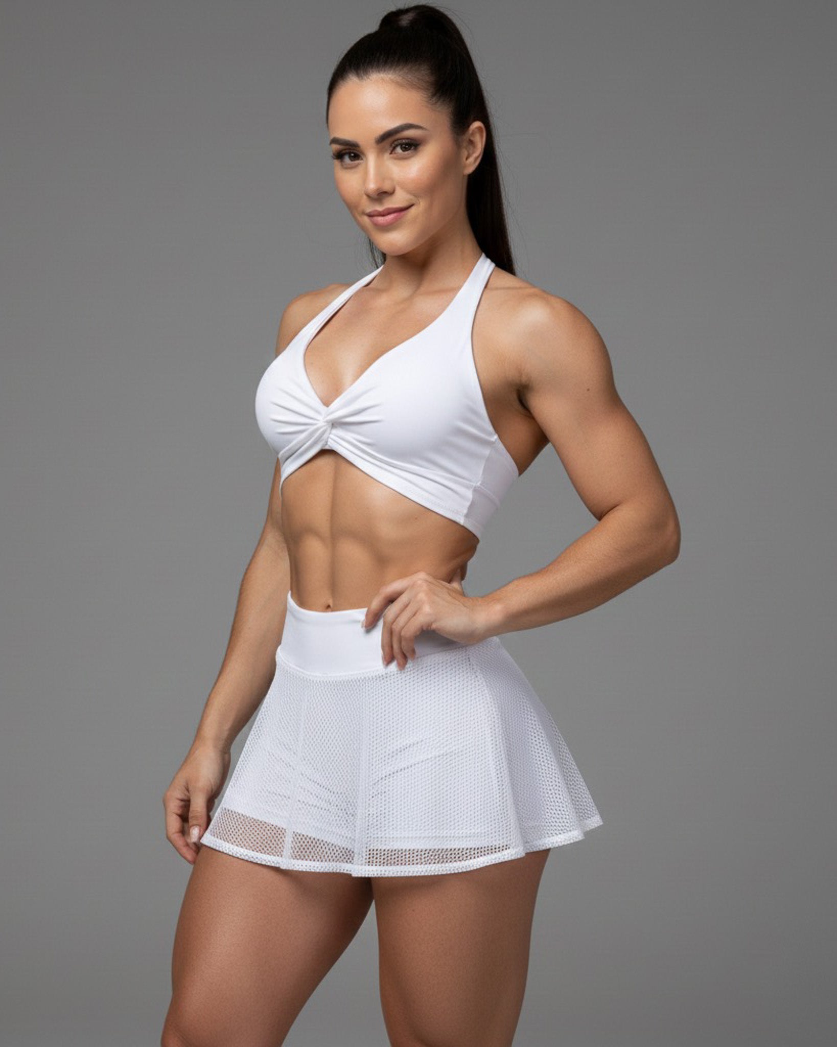 Conjunto Deportivo Peto y Falda Short con Malla